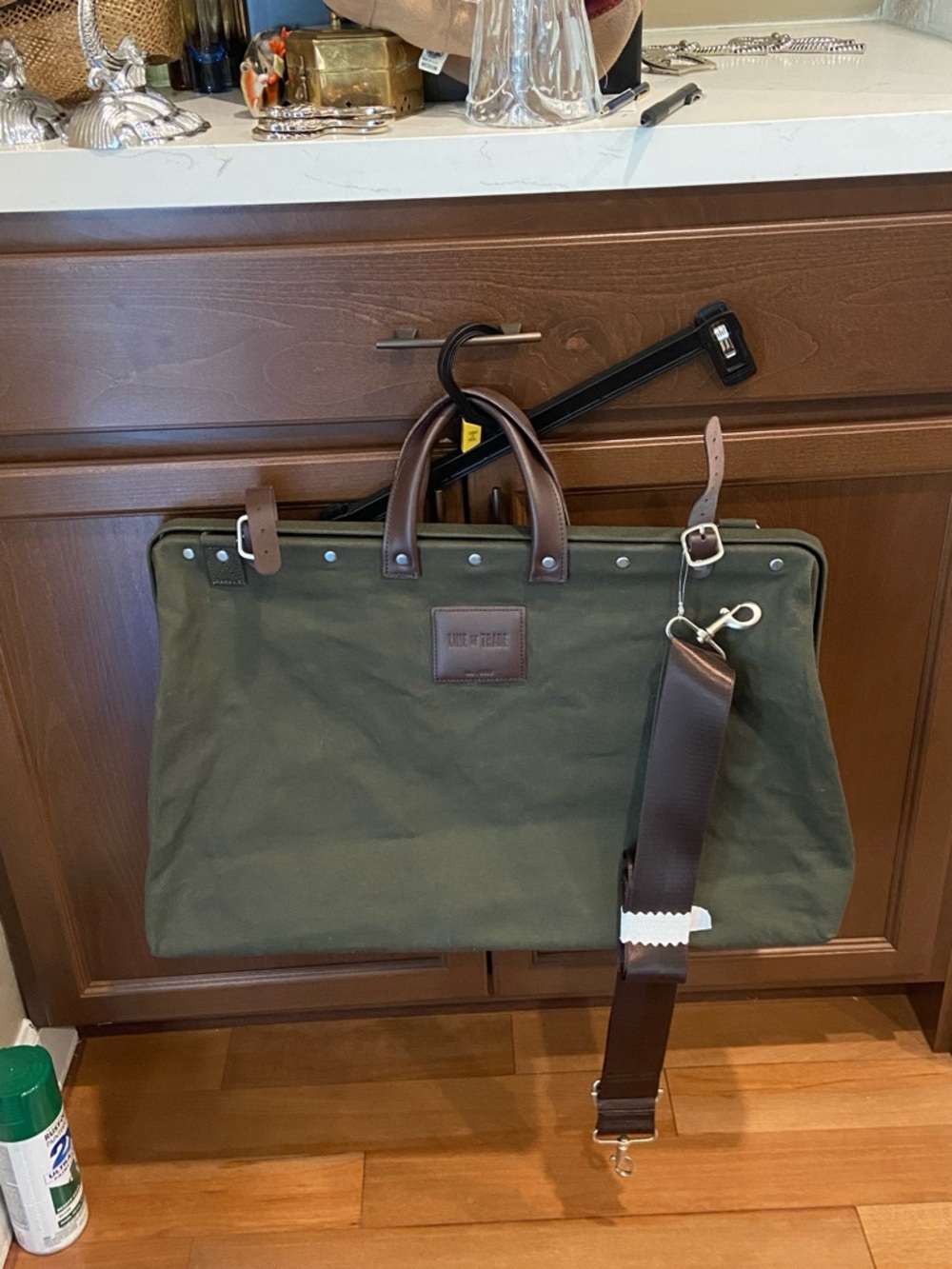 Line of trade Olive Canvas Duffel with Brown Leather Trim and Detachable Strap